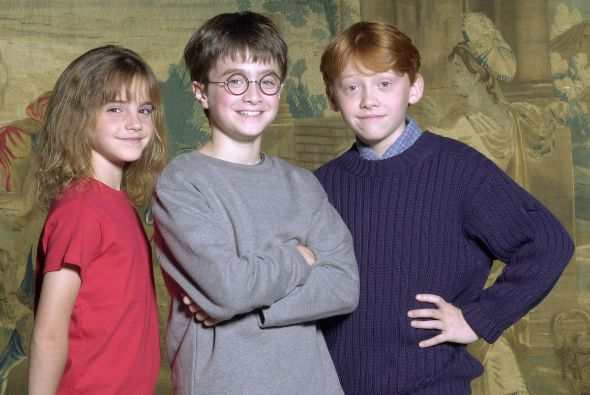 Harry Potter met en vedette Emma Watson, Daniel Radcliffe et Rupert Grint posent pour l'annonce du casting