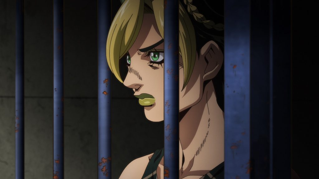 Jolyne Cujoh dans 'JoJo's Bizarre Adventure Stone Ocean' Partie 1 sur Netflix.  Elle regarde derrière les barreaux.