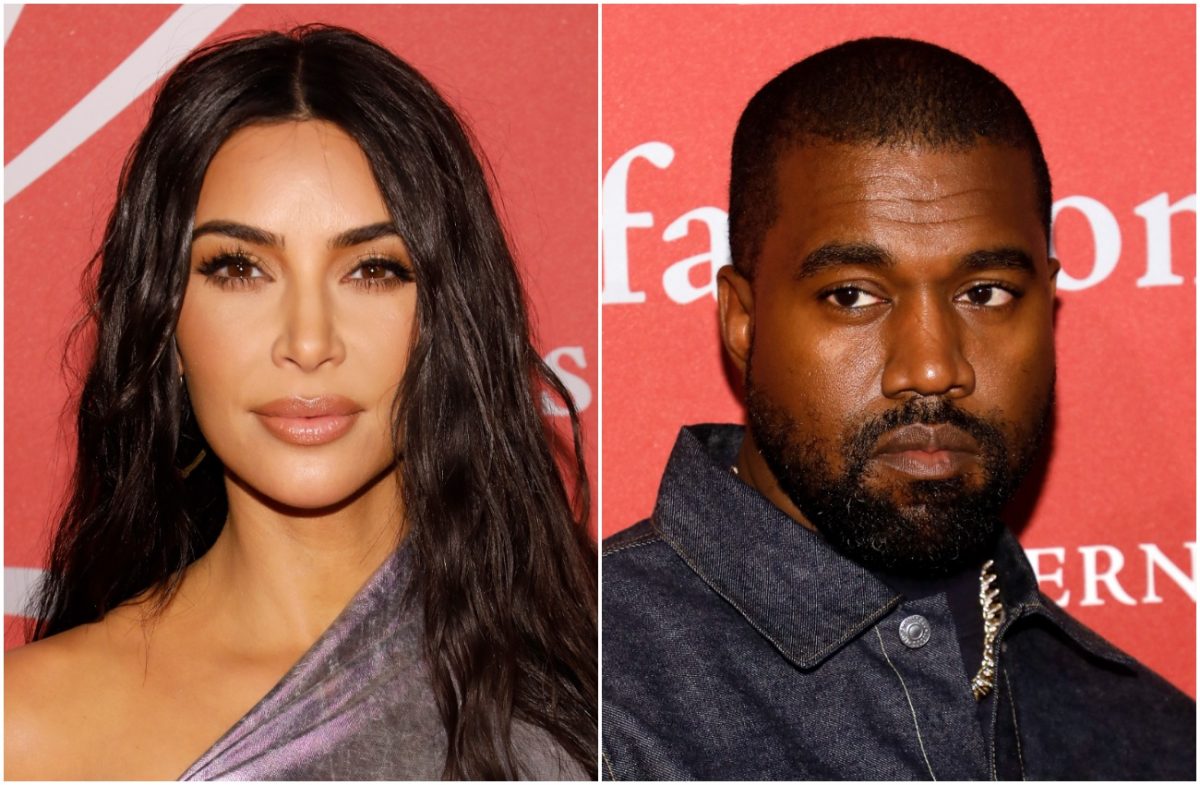 Kim Kardashian regarde la caméra dans un haut à épaules dénudées, Kanye West regarde sur le côté dans une tenue sombre