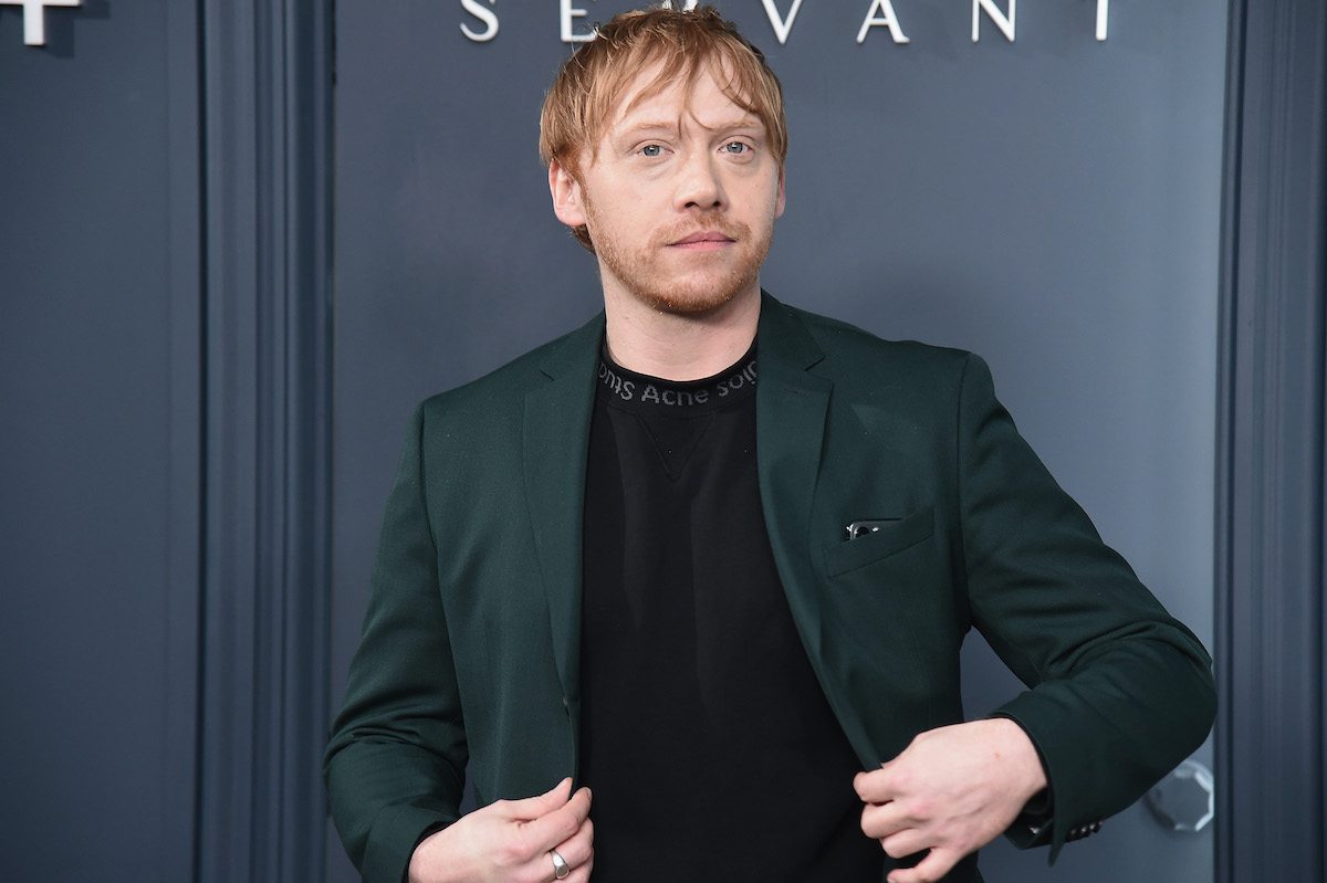Le propriétaire d'un camion de crème glacée, Rupert Grint, pose pour des photos de 