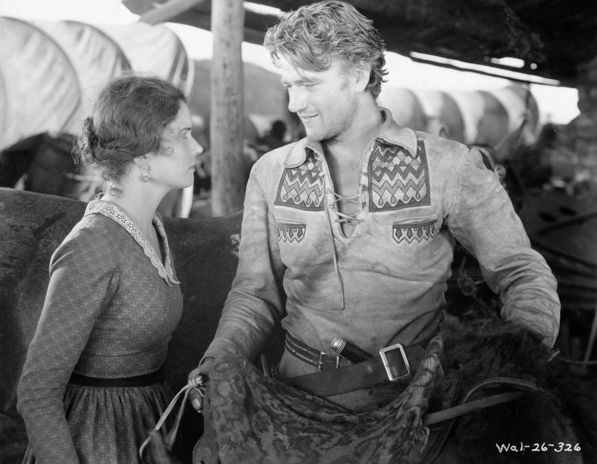 John Wayne dans le rôle de Breck Coleman et Marguerite Churchill dans le rôle de Ruth Cameron dans l'un de ses premiers films 