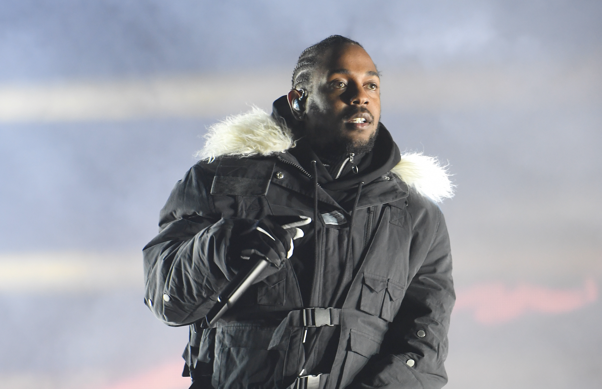 Kendrick Lamar portant une veste verte