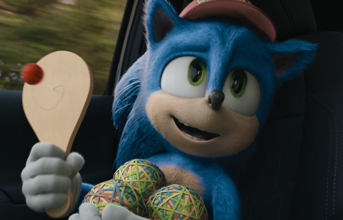 Sonic tenant trois balles élastiques et un jouet de ping-pong dans