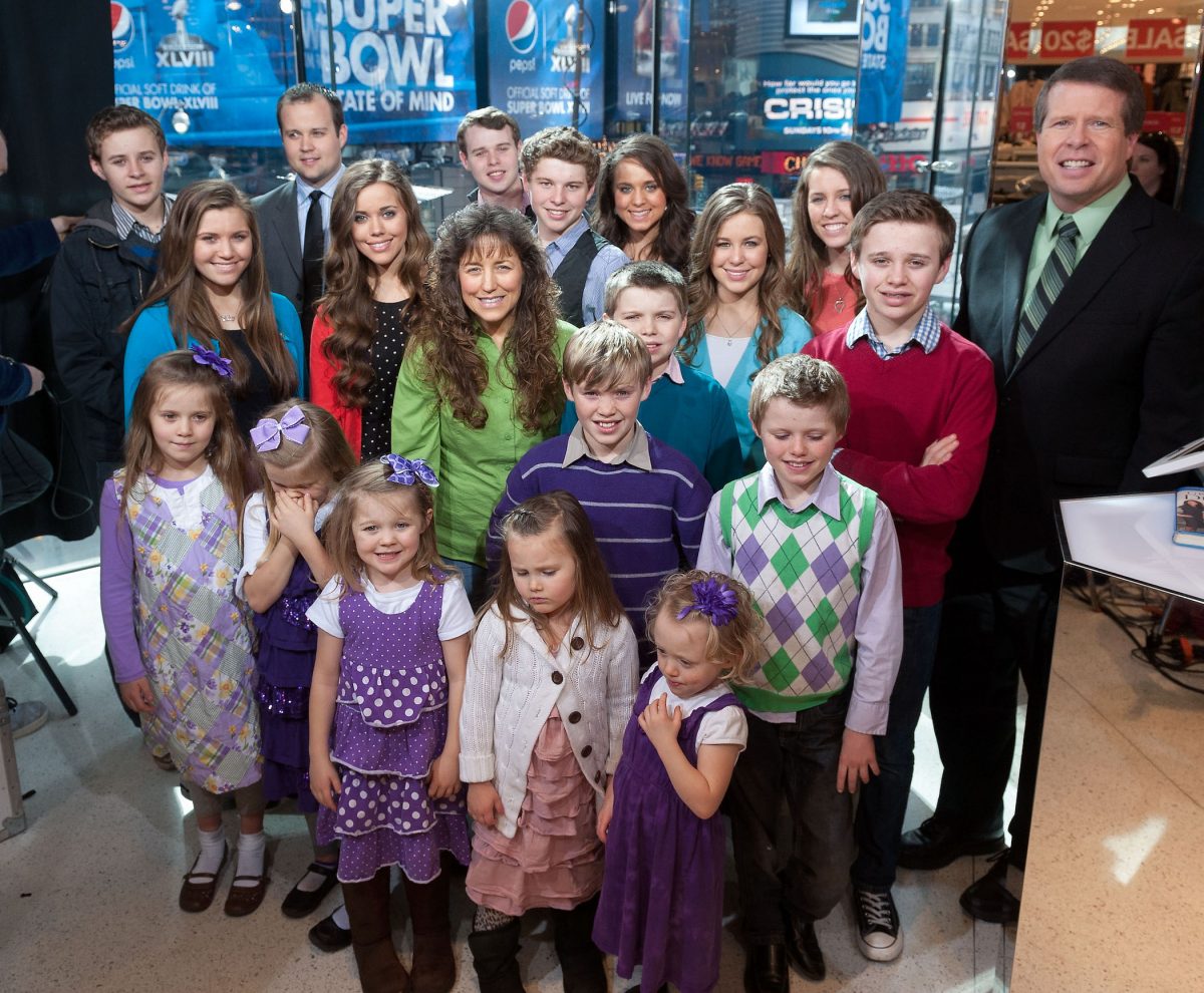 La famille Duggar souriante sur le tournage de