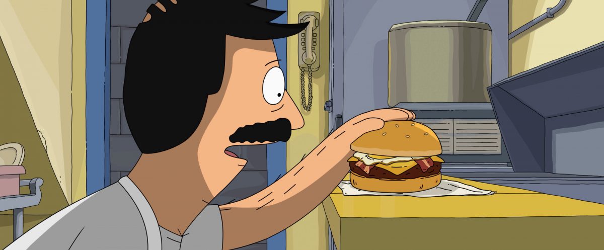 'The Bob's Burgers Movie' Bob Belcher (exprimé par H. Jon Benjamin) regardant un hamburger et posant sa main dessus