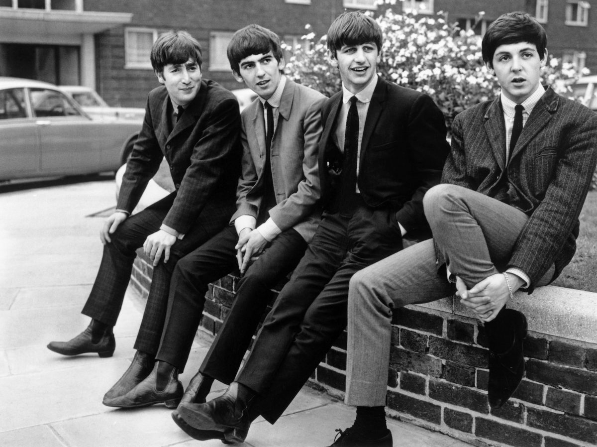 Les membres des Beatles John Lennon, George Harrison, Ringo Starr et Paul McCartney
