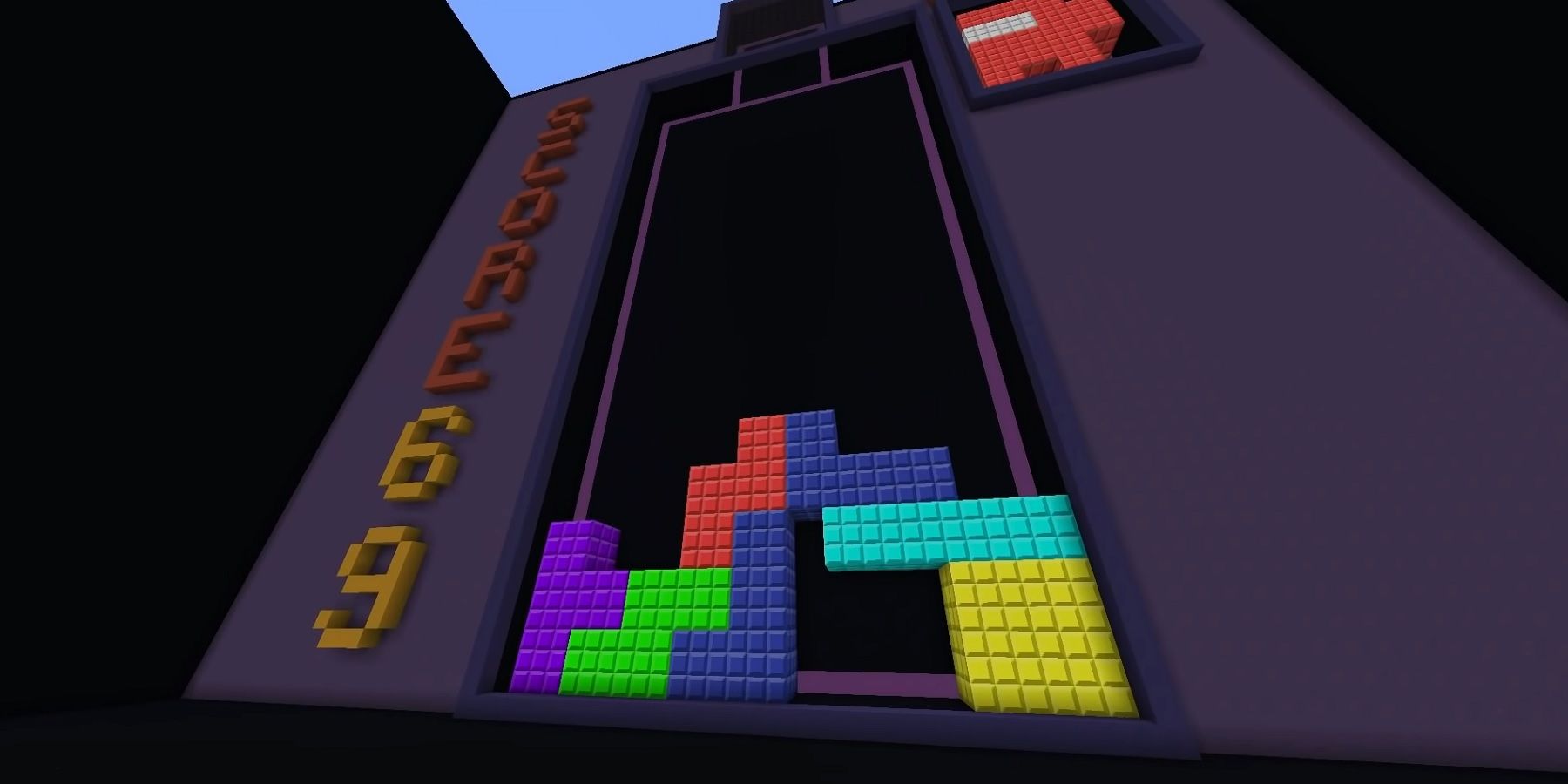 Capture d'écran de Minecraft montrant un jeu Tetris géant.