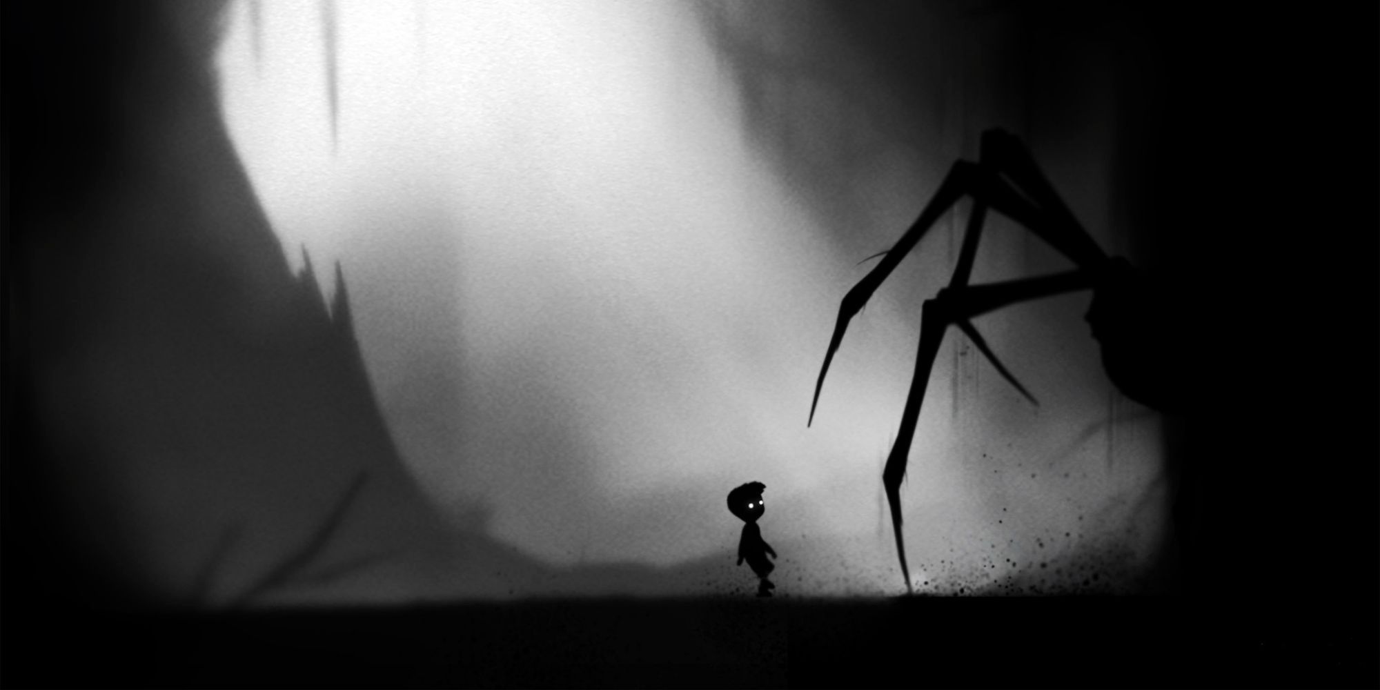 Le protagoniste de Limbo confronté à une araignée géante et sombre