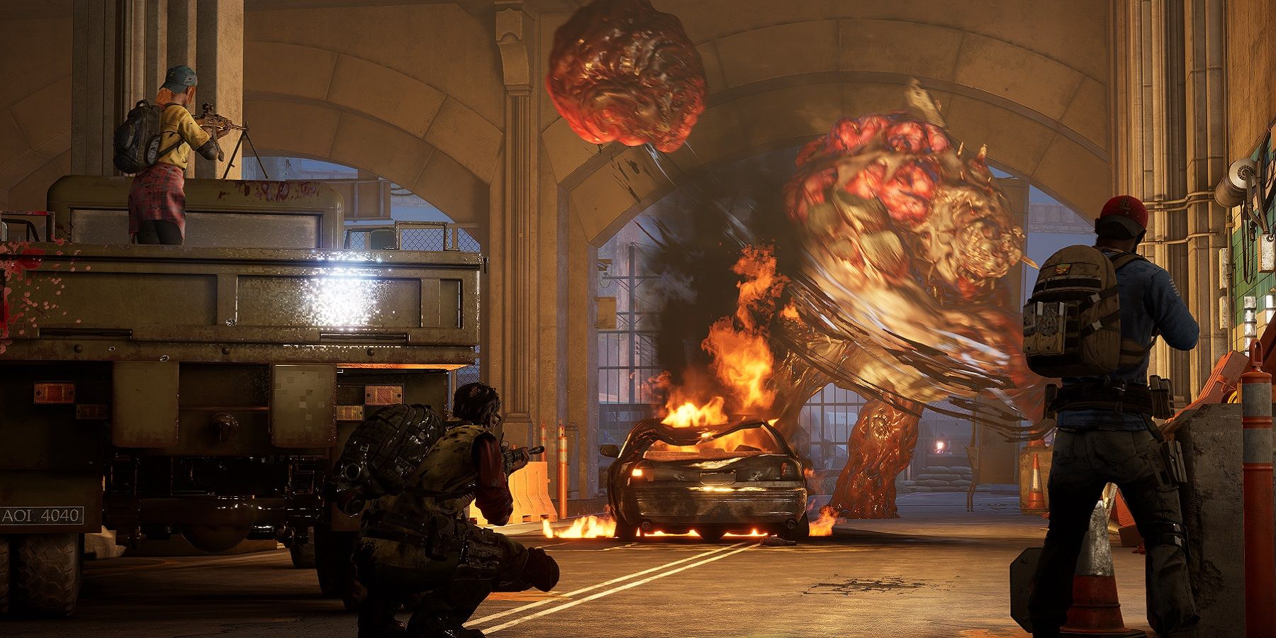 Image de Back 4 Blood montrant les nettoyeurs combattant un ogre dans un tunnel.