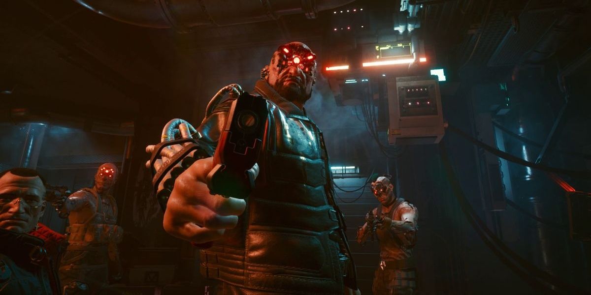 personnage cyberpunk 2077 pointant une arme sur le joueur 