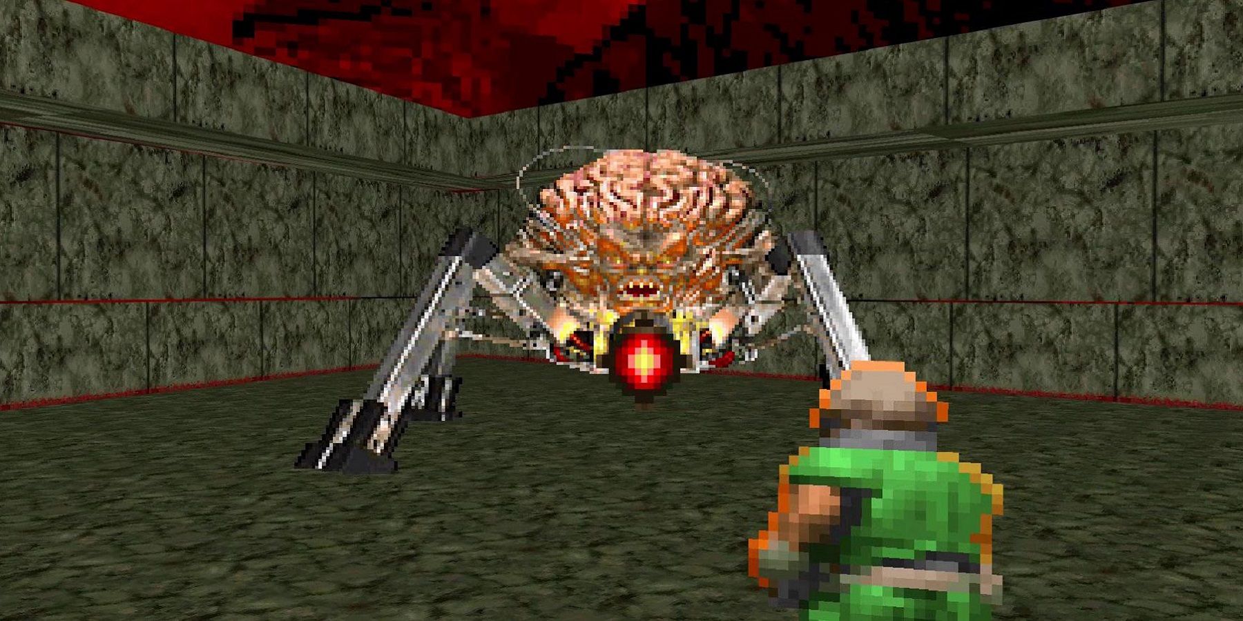 Capture d'écran de Doom montrant le Doomguy combattant le Spider Mastermind.