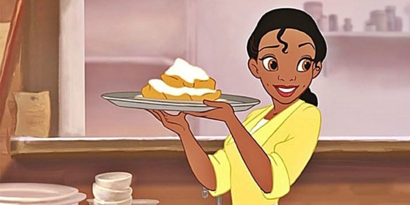 Tiana tenant des beignets dans La princesse et la grenouille