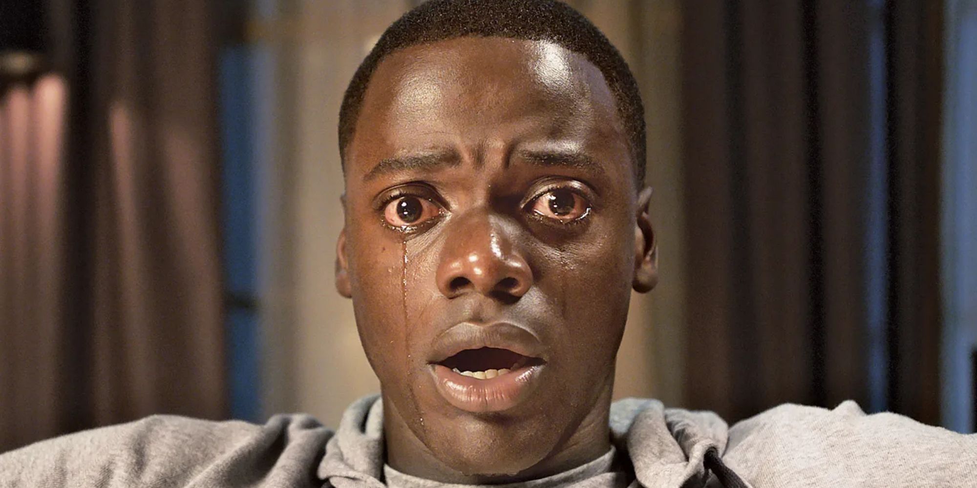 Daniel Kaluuya dans le rôle de Chris Washington pleurant et affligé dans 