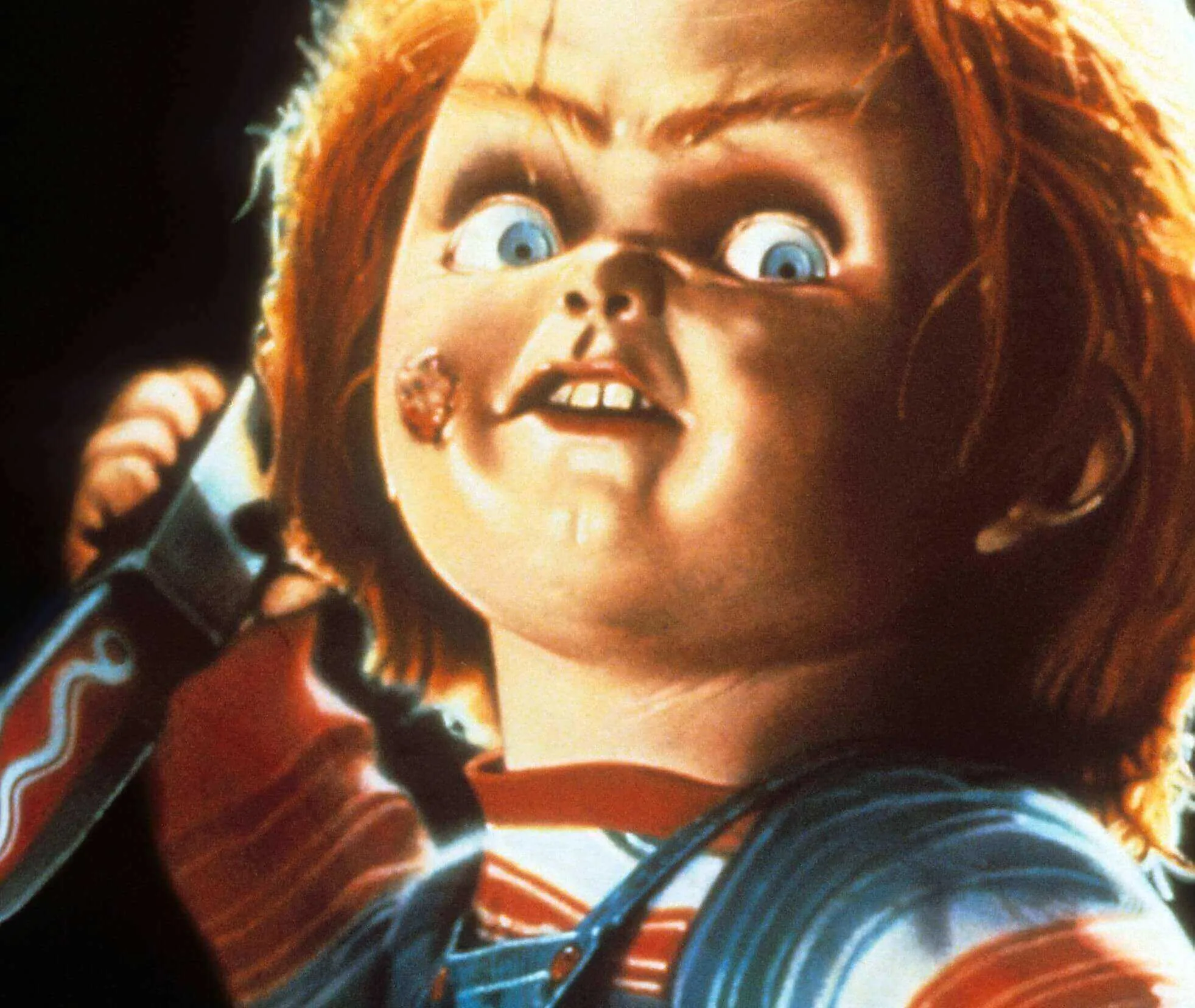 Chucky la poupée avec un couteau